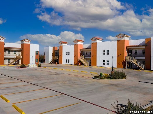 118 Grass Valley Road, Unit 208 Eagle Pass, TX 78852 - Photo 27 of 28 a view of a building with a street