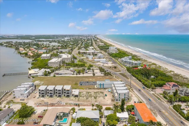a view of city with ocean