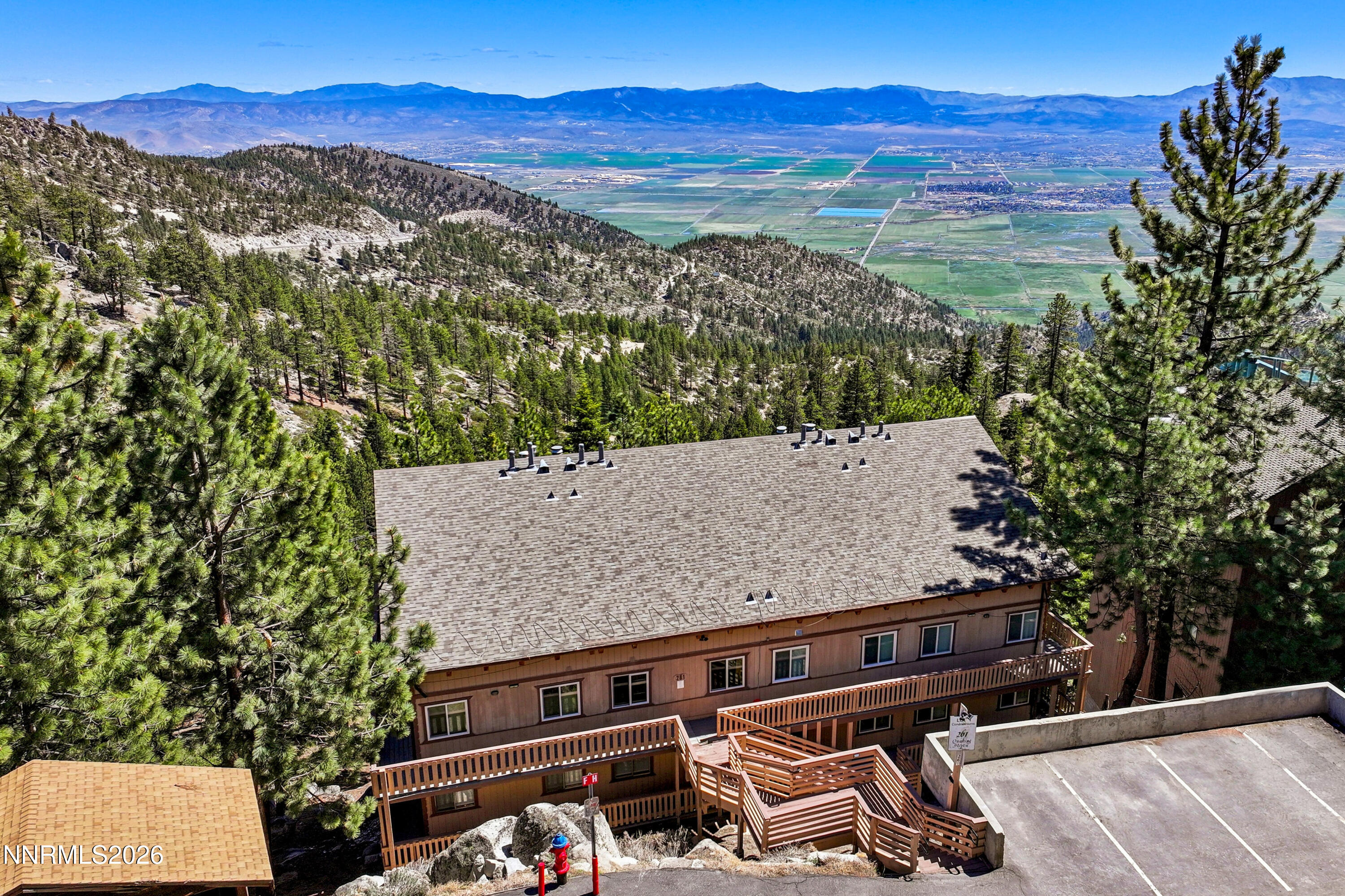 261 Quaking Aspen Lane, Unit D Stateline, NV 89449 - Photo 1 of 44 a view of a terrace with a garden
