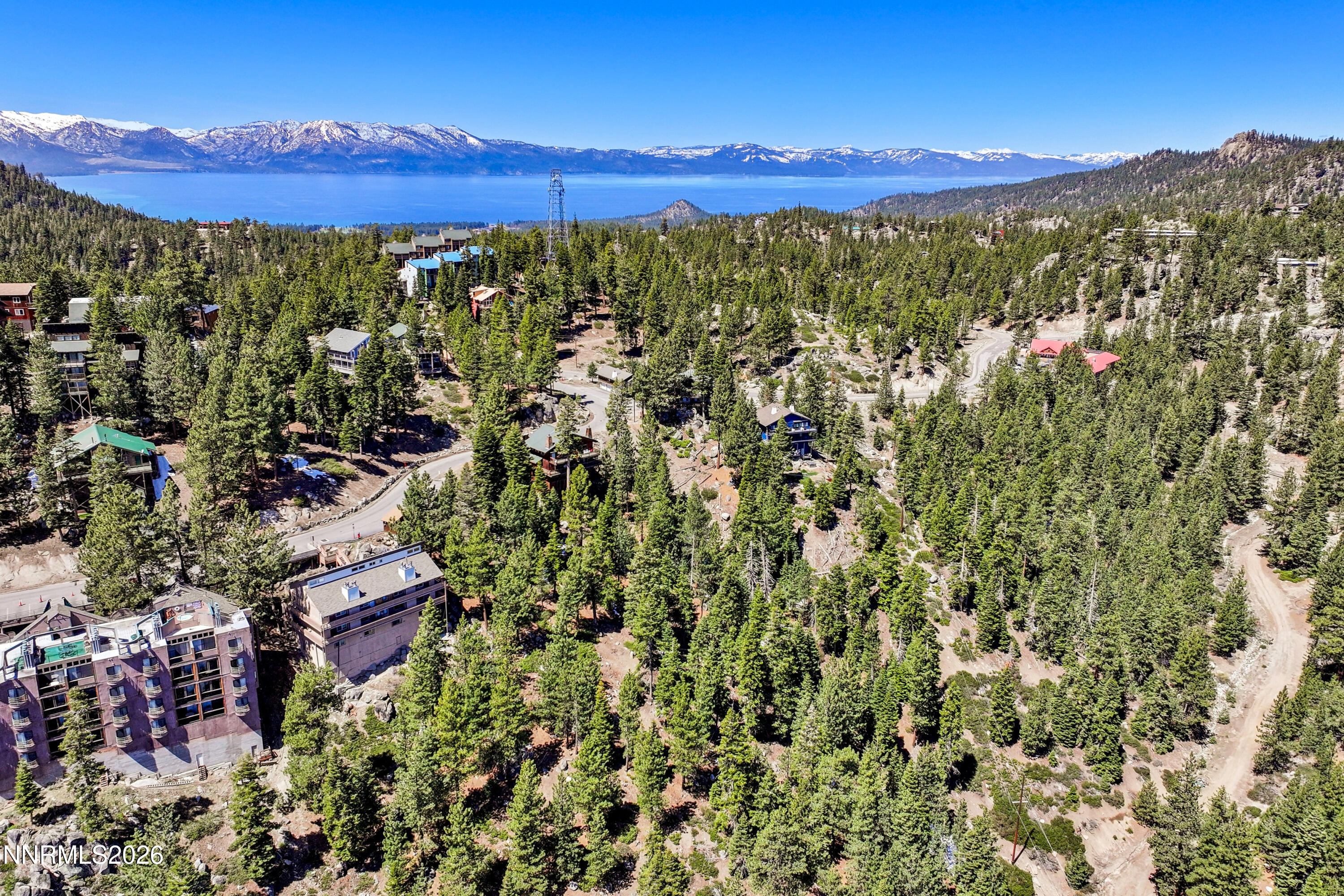 261 Quaking Aspen Lane, Unit D Stateline, NV 89449 - Photo 15 of 44 a view of a city with lush green forest