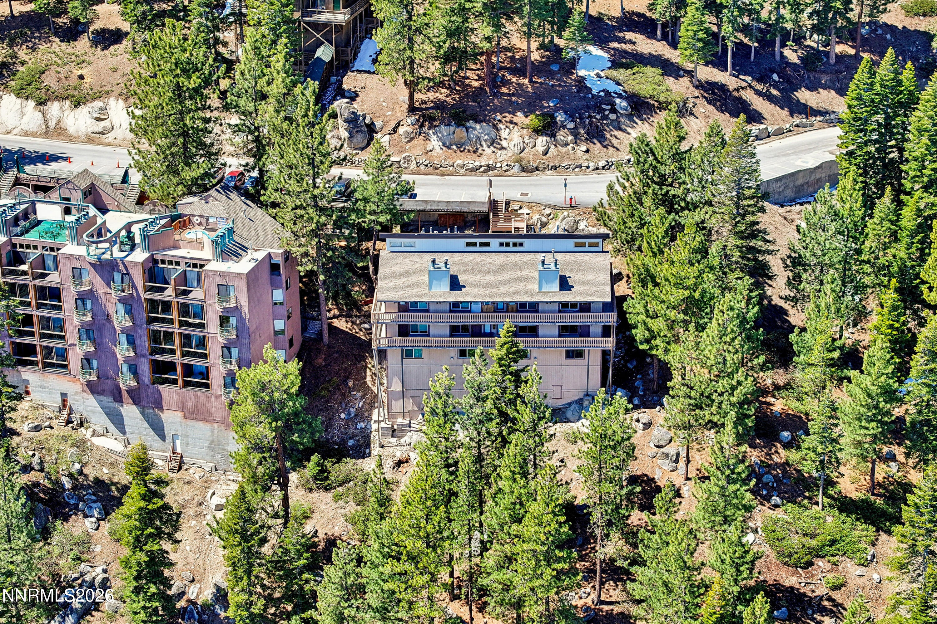 261 Quaking Aspen Lane, Unit D Stateline, NV 89449 - Photo 16 of 44 an aerial view of a house with a yard and garden