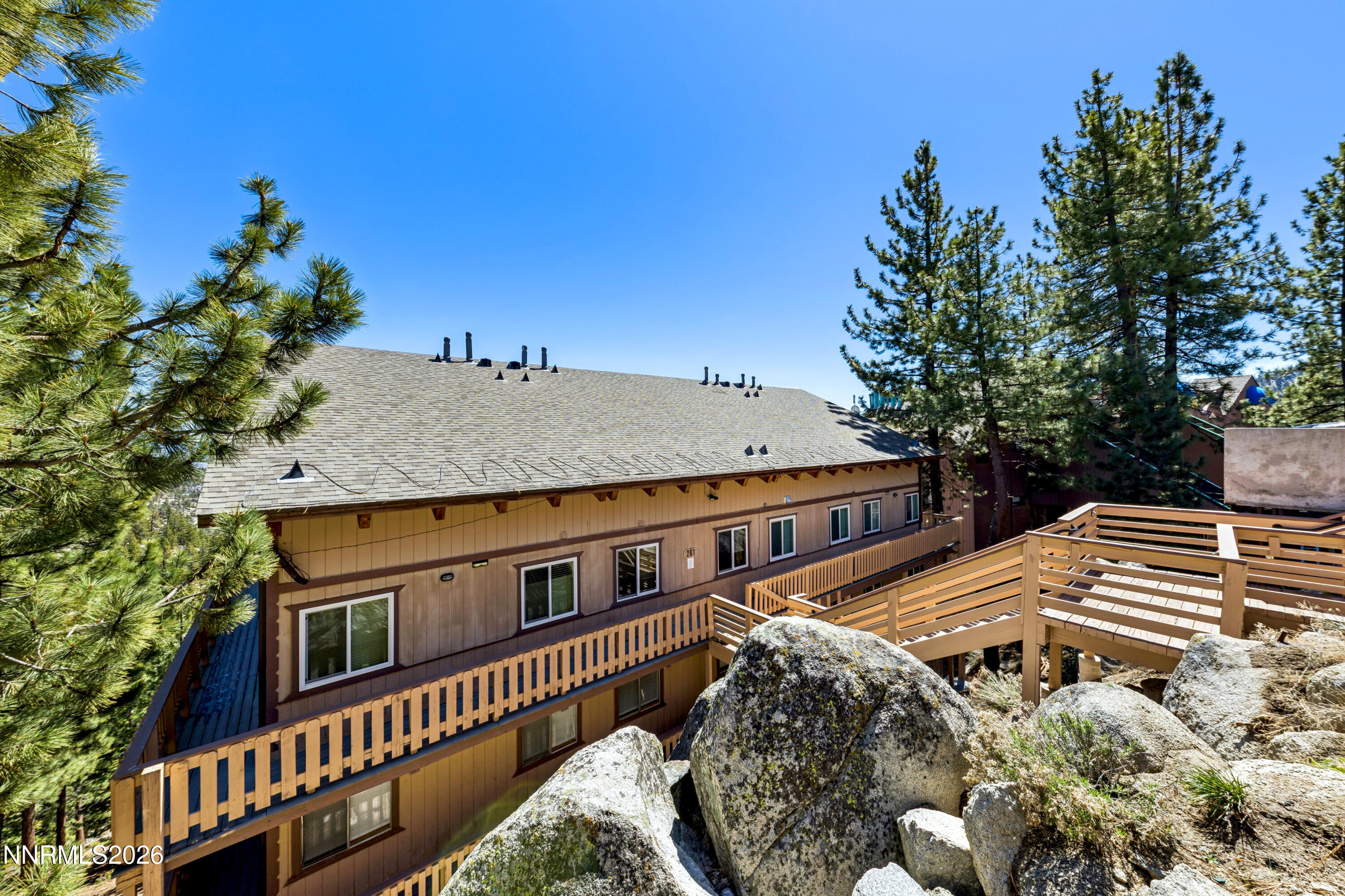 261 Quaking Aspen Lane, Unit D Stateline, NV 89449 - Photo 18 of 44 a view of balcony with two chairs and a table