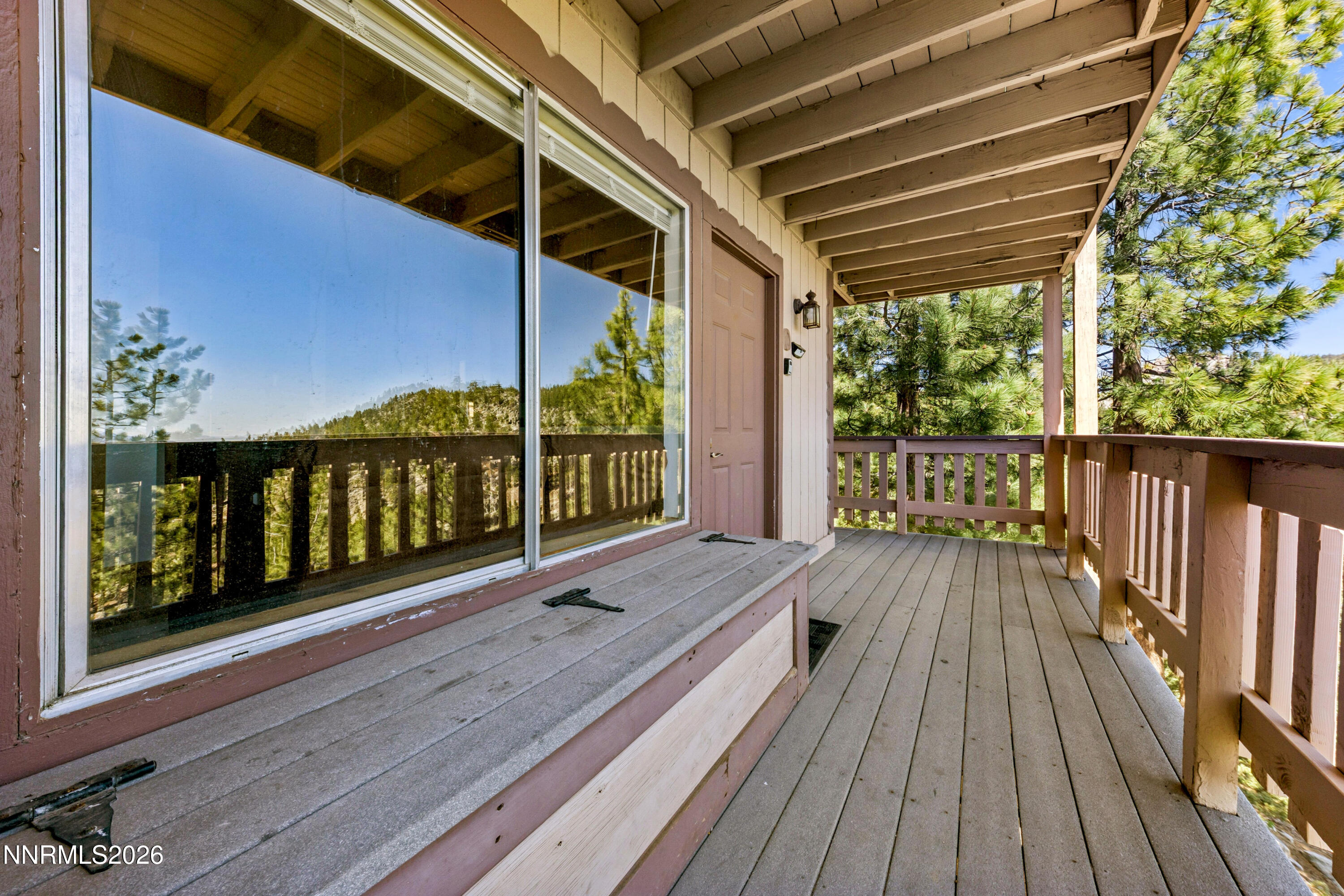 261 Quaking Aspen Lane, Unit D Stateline, NV 89449 - Photo 23 of 44 a balcony with wooden floor