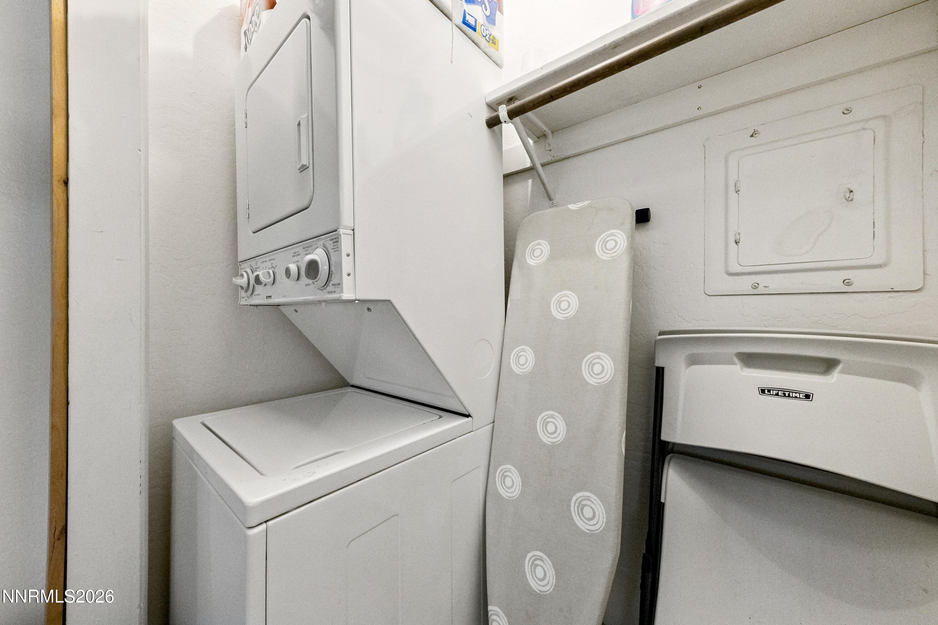 261 Quaking Aspen Lane, Unit D Stateline, NV 89449 - Photo 36 of 44 a utility room with dryer and washer
