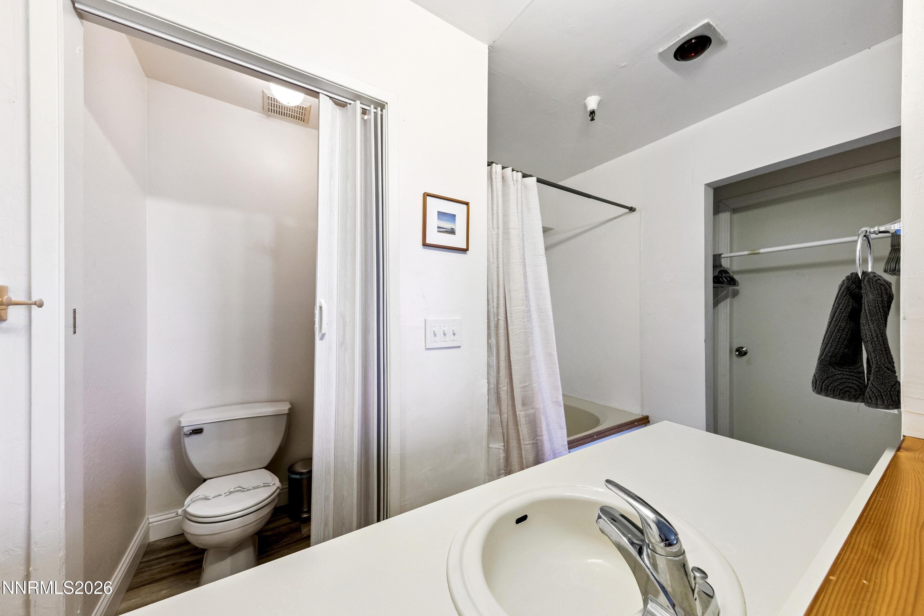 261 Quaking Aspen Lane, Unit D Stateline, NV 89449 - Photo 42 of 44 a bathroom with a sink and toilet