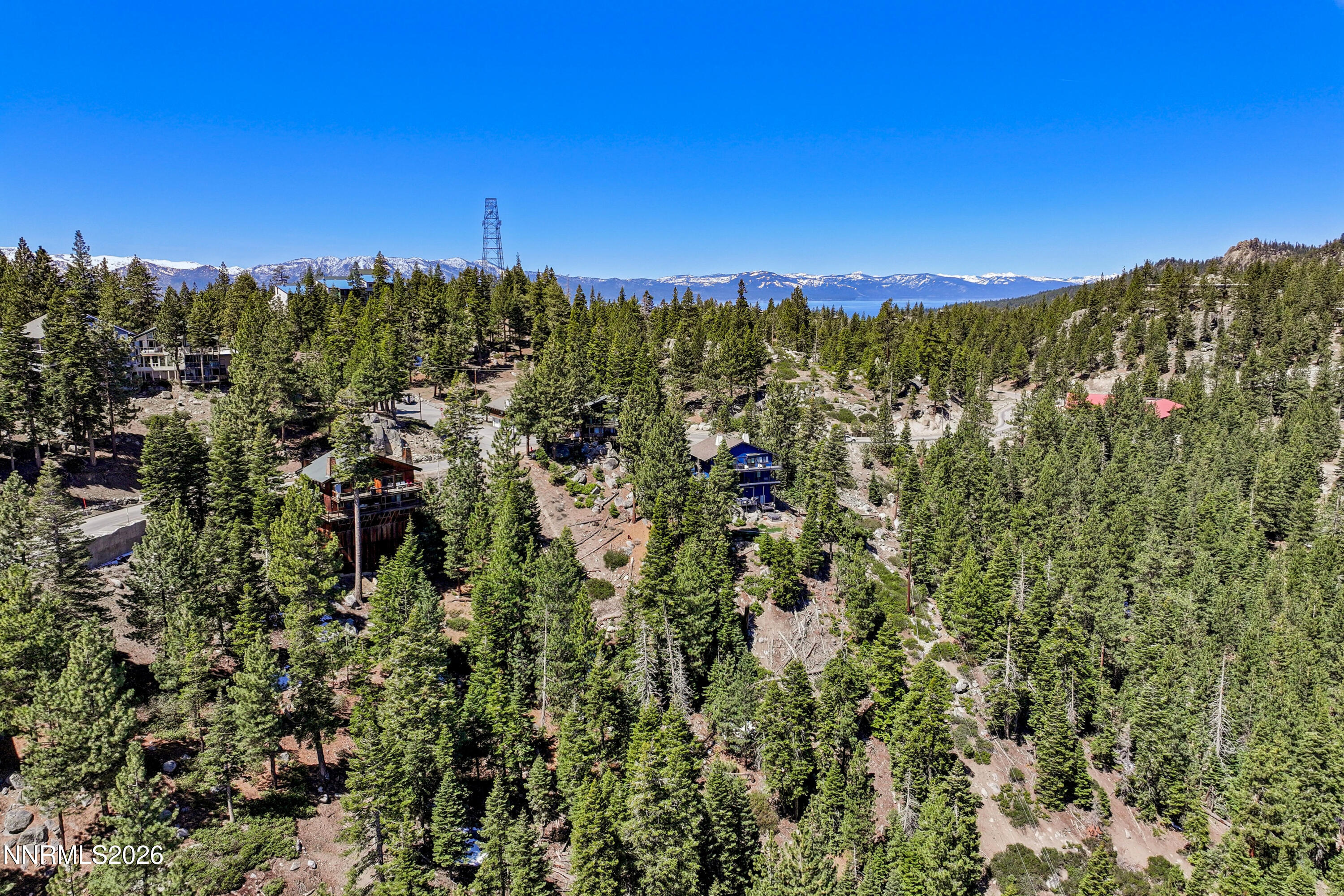 261 Quaking Aspen Lane, Unit D Stateline, NV 89449 - Photo 9 of 44 a view of a city with lush green forest