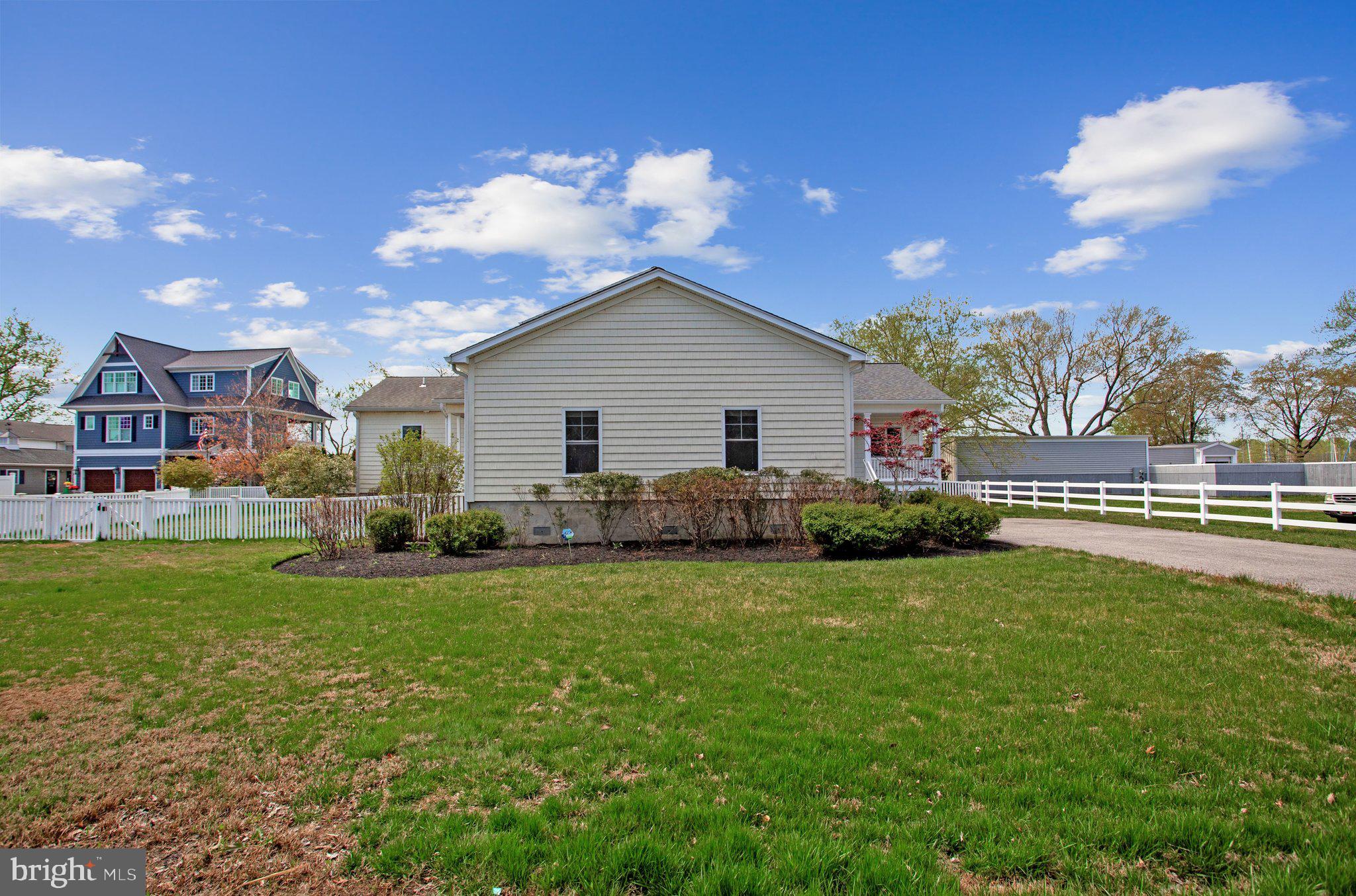 6146 Drum Point Road Deale, MD 20751 - Photo 72 of 75 a front view of a house with garden