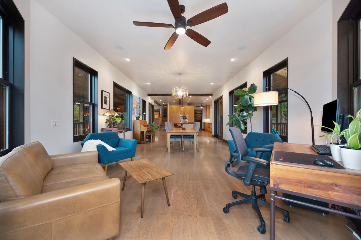 9475 King Road Loomis, CA 95650 - Photo 29 of 96 a living room with furniture a ceiling fan and a rug