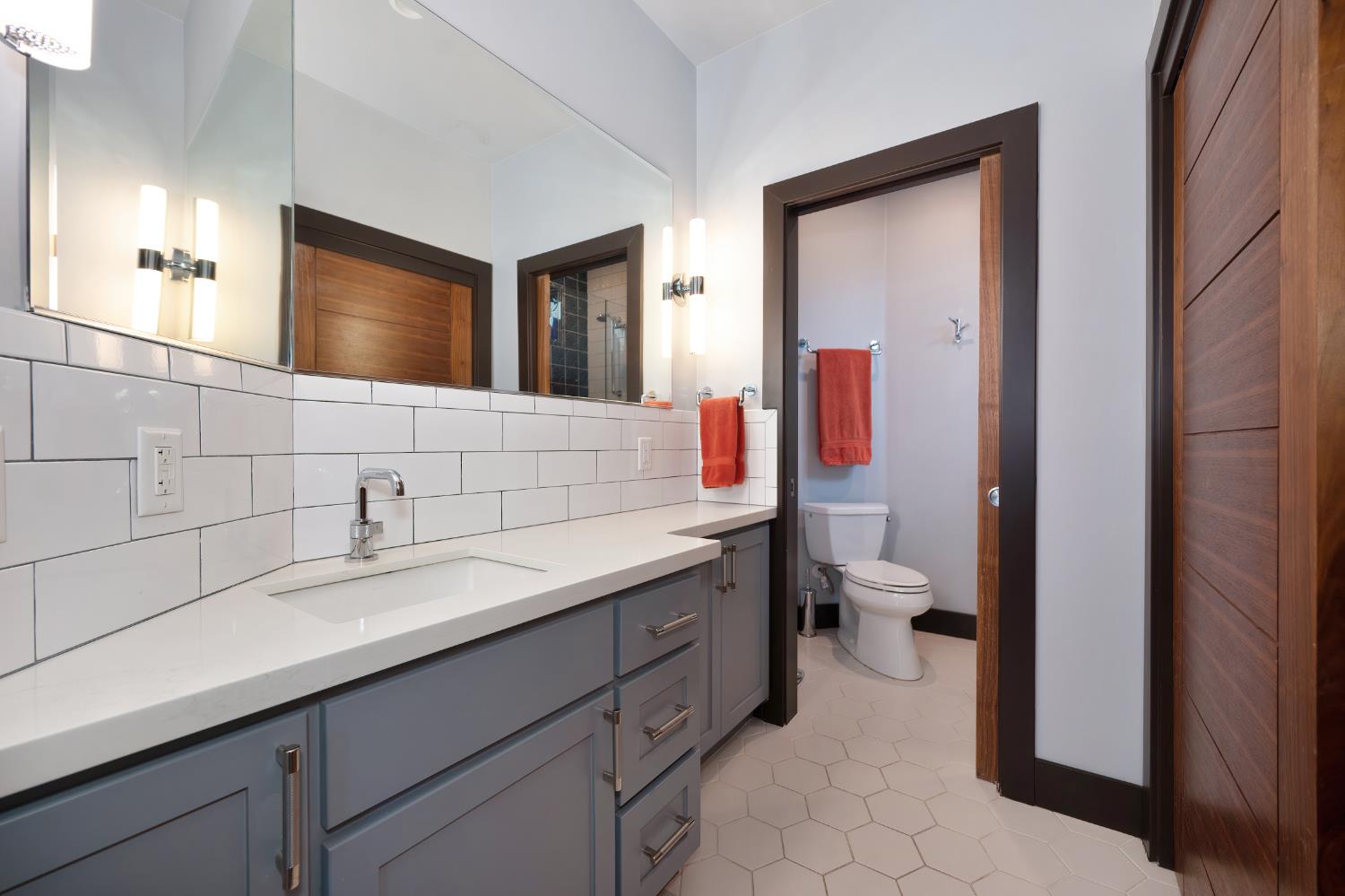 9475 King Road Loomis, CA 95650 - Photo 45 of 96 a bathroom with a sink and a mirror