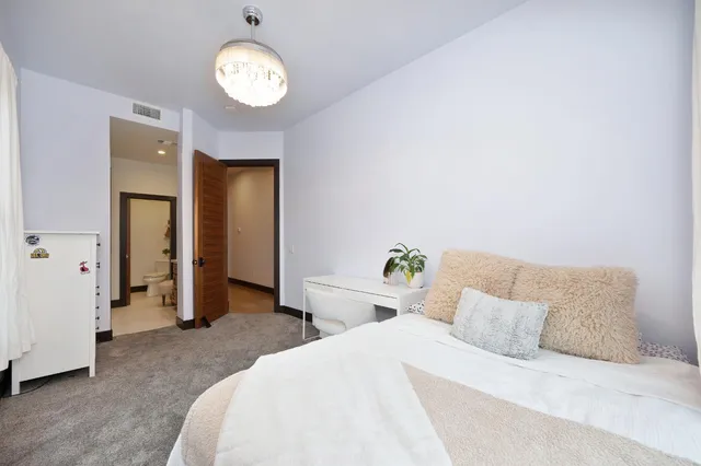 an aerial view of a house with a garden