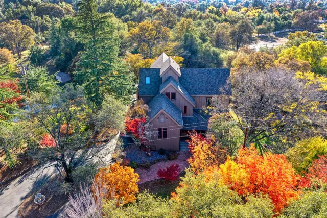 a view of a livingroom with furniture and a flat screen tv