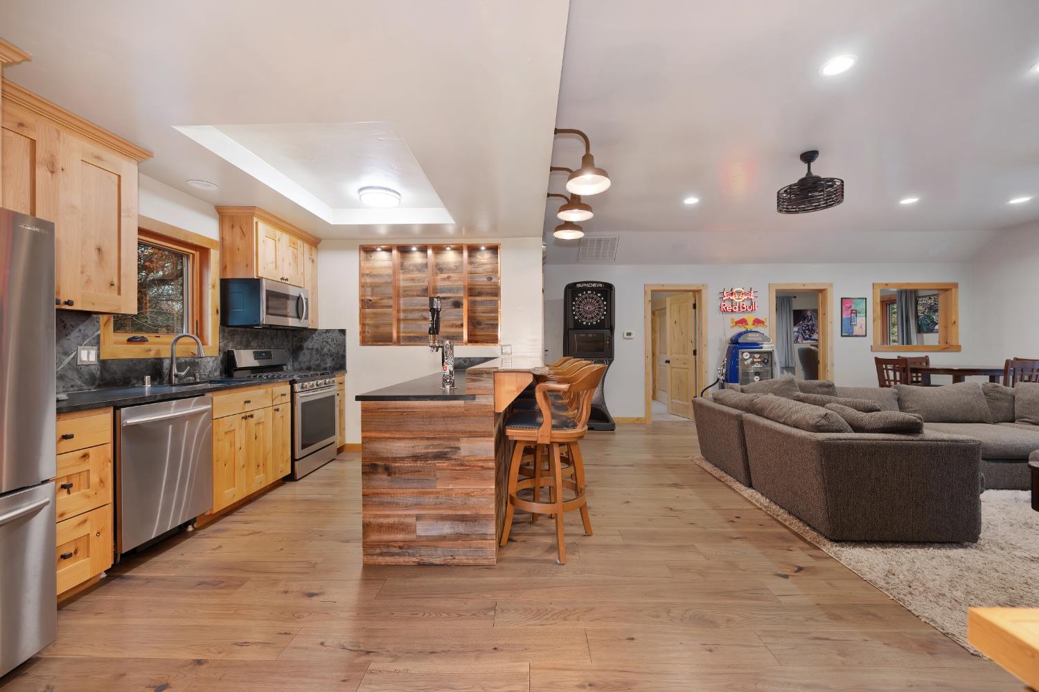 9475 King Road Loomis, CA 95650 - Photo 71 of 96 a living room with furniture kitchen and a wooden floor