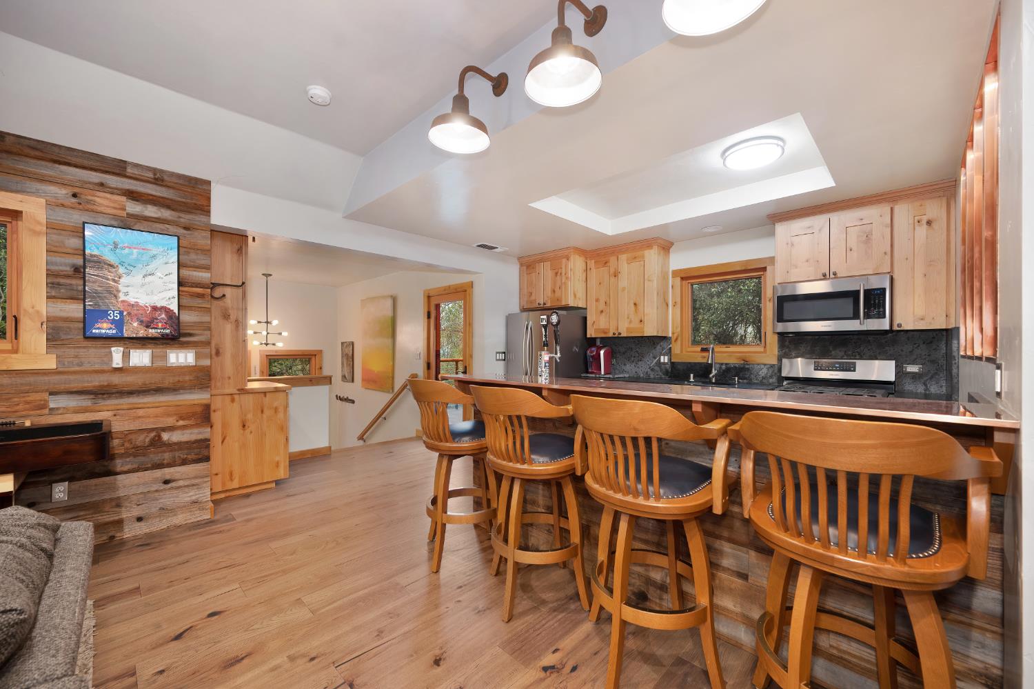 9475 King Road Loomis, CA 95650 - Photo 73 of 96 a kitchen with stainless steel appliances granite countertop a kitchen island hardwood floor and a sink