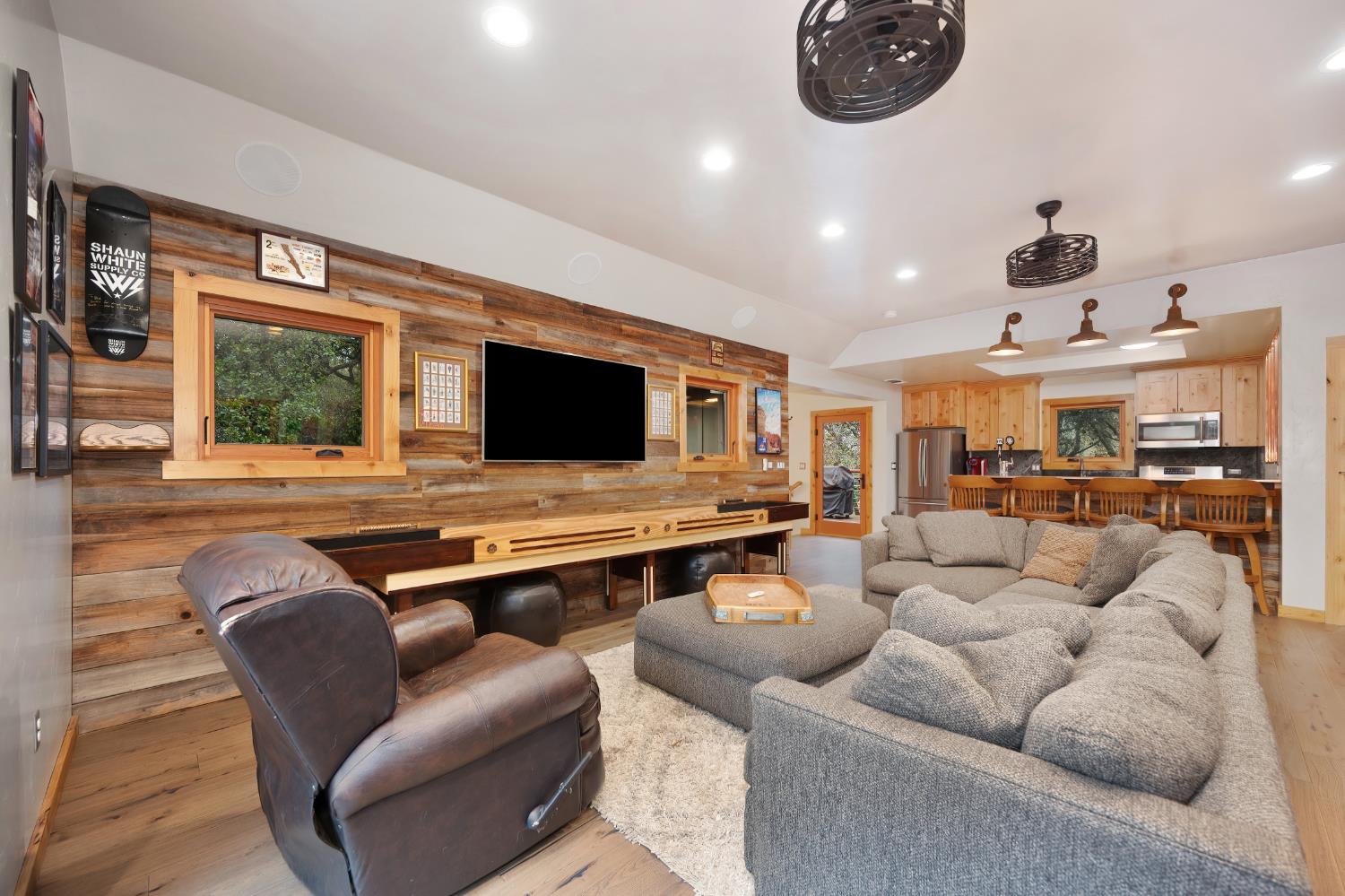 9475 King Road Loomis, CA 95650 - Photo 76 of 96 a living room with furniture and a flat screen tv