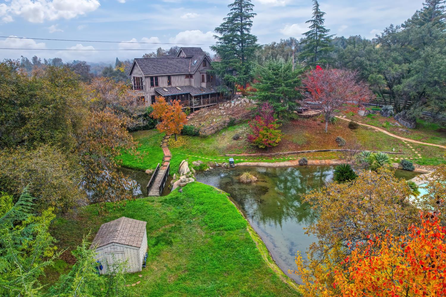 9475 King Road Loomis, CA 95650 - Photo 94 of 96 an aerial view of a house with a garden