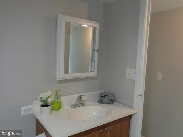 a bathroom with a shower and a shower