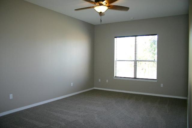 3077 Border Creek Drive Crestview, FL 32539 - Photo 18 of 33 an empty room with a window