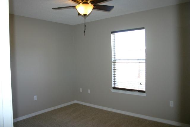 3077 Border Creek Drive Crestview, FL 32539 - Photo 27 of 33 an empty room with a window