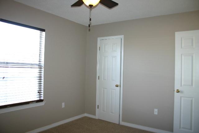 3077 Border Creek Drive Crestview, FL 32539 - Photo 28 of 33 a view of an empty room with a window
