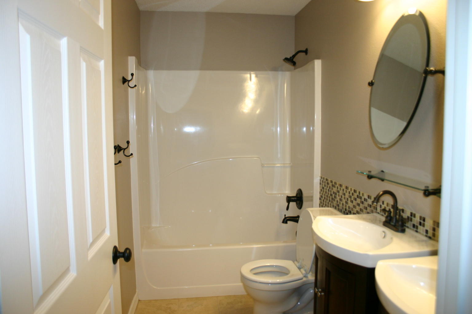3077 Border Creek Drive Crestview, FL 32539 - Photo 29 of 33 a bathroom with a sink toilet and shower