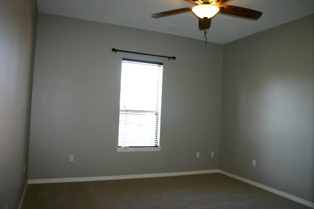3077 Border Creek Drive Crestview, FL 32539 - Photo 31 of 33 an empty room with a window