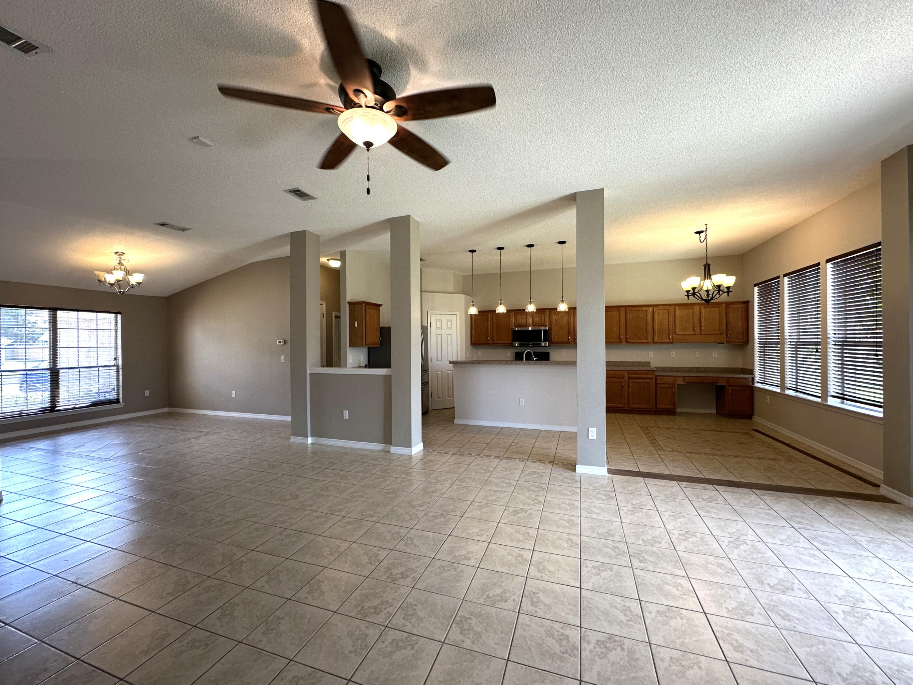 3077 Border Creek Drive Crestview, FL 32539 - Photo 5 of 33 a view of an entryway with a kitchen