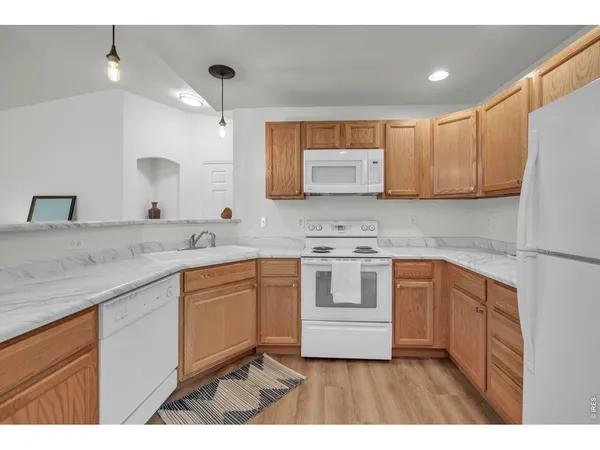 $375,000 | 1703 Whitehall Drive, Unit 1H, Longmont, CO 80504