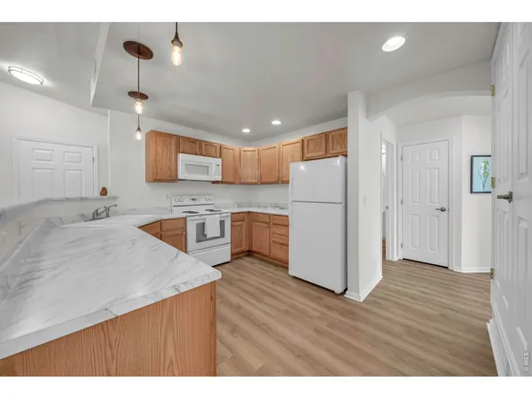 $375,000 | 1703 Whitehall Drive, Unit 1H, Longmont, CO 80504