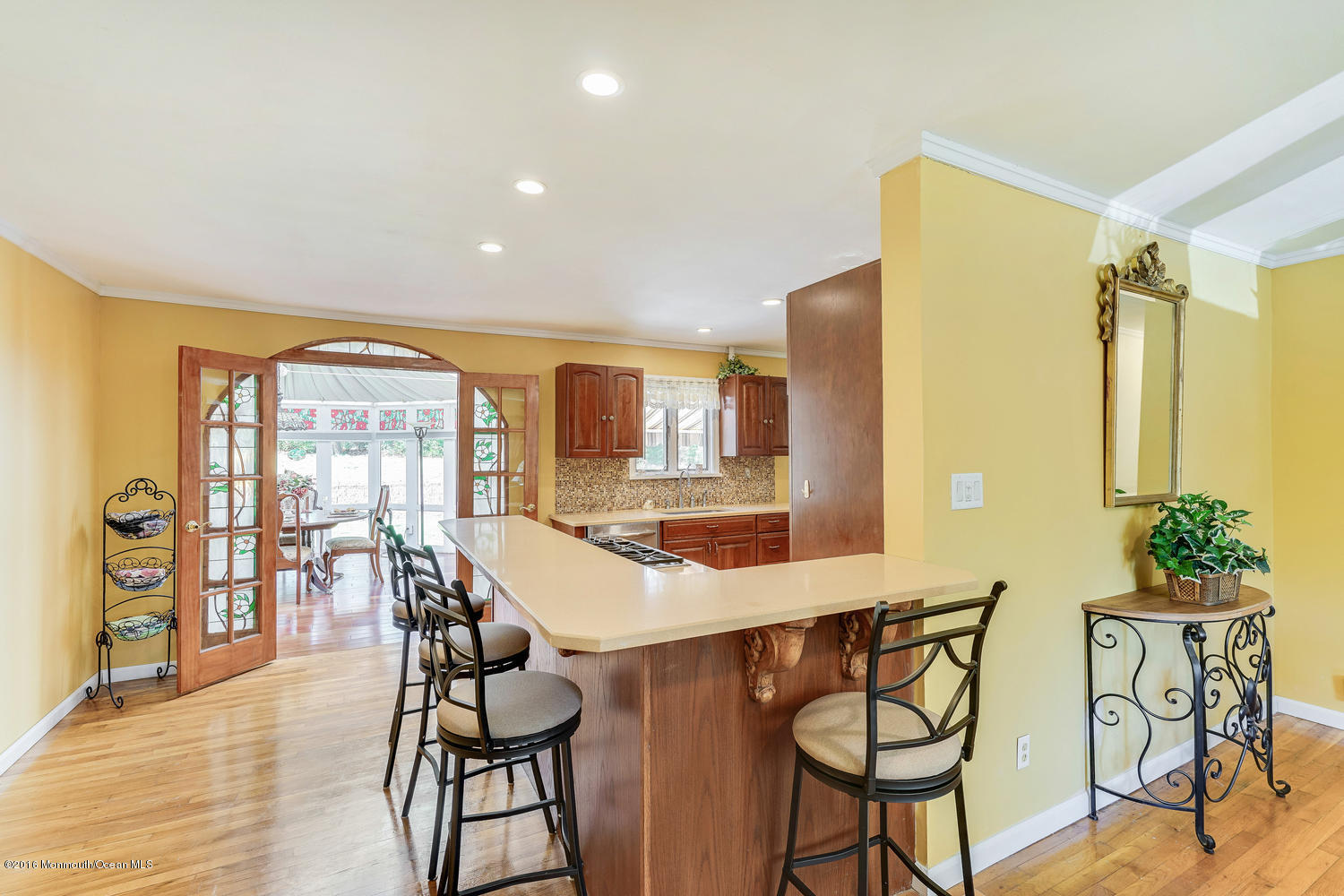 9 Chestnut Ridge Road Holmdel, NJ 07733 - Photo 13 of 39 a view of a dining room with furniture window and wooden floor