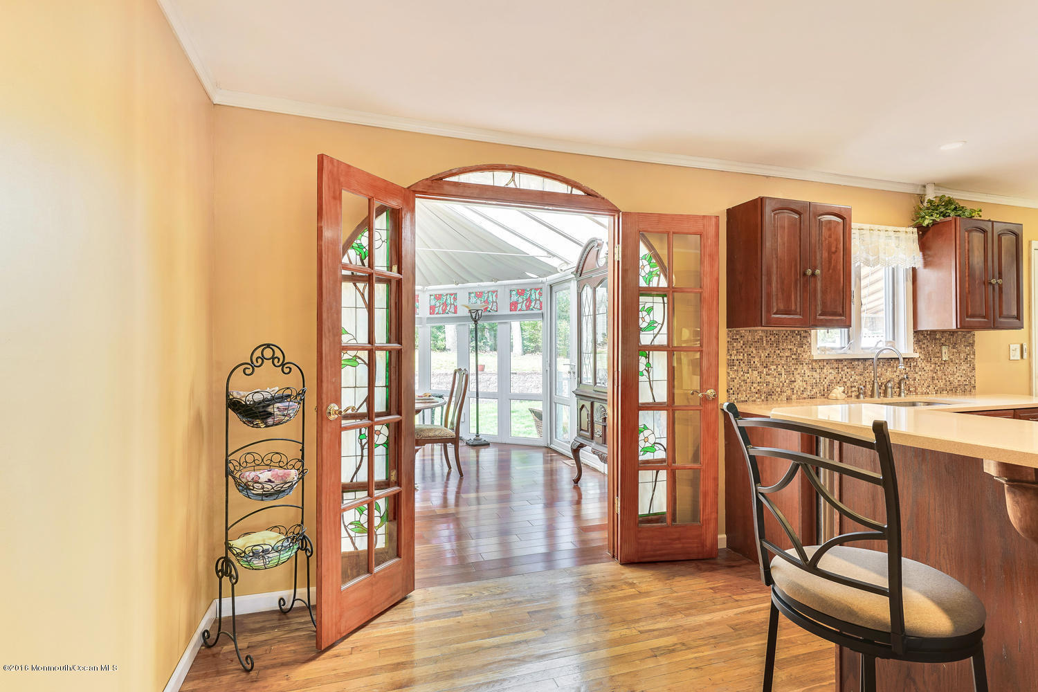 9 Chestnut Ridge Road Holmdel, NJ 07733 - Photo 14 of 39 a view of a entryway with furniture and wooden floor