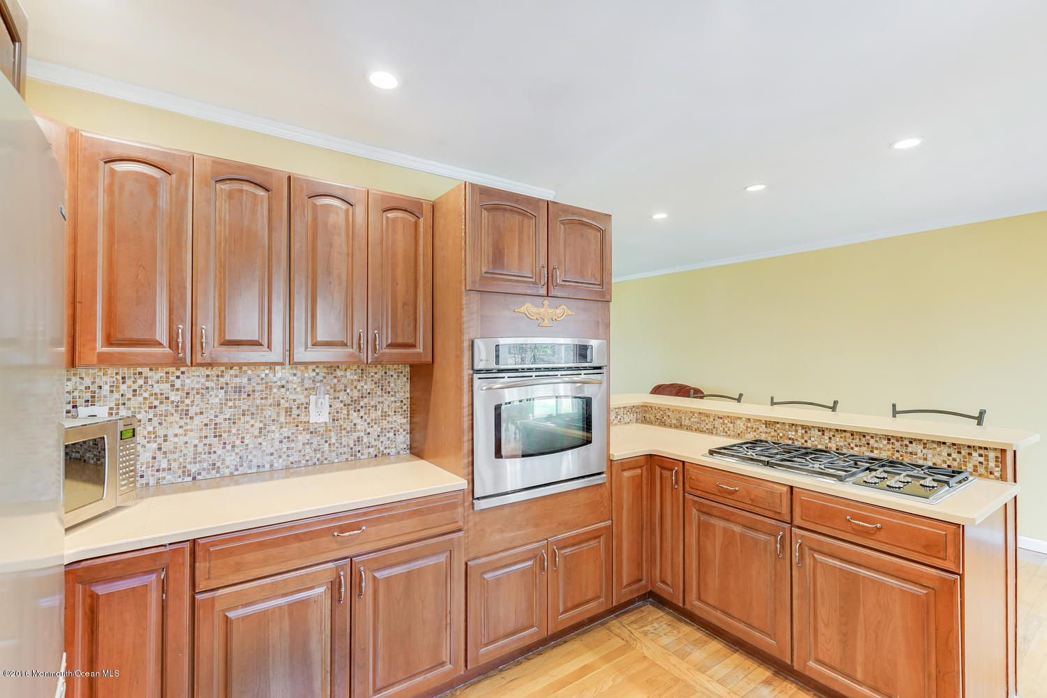 9 Chestnut Ridge Road Holmdel, NJ 07733 - Photo 18 of 39 a kitchen with granite countertop cabinets and window