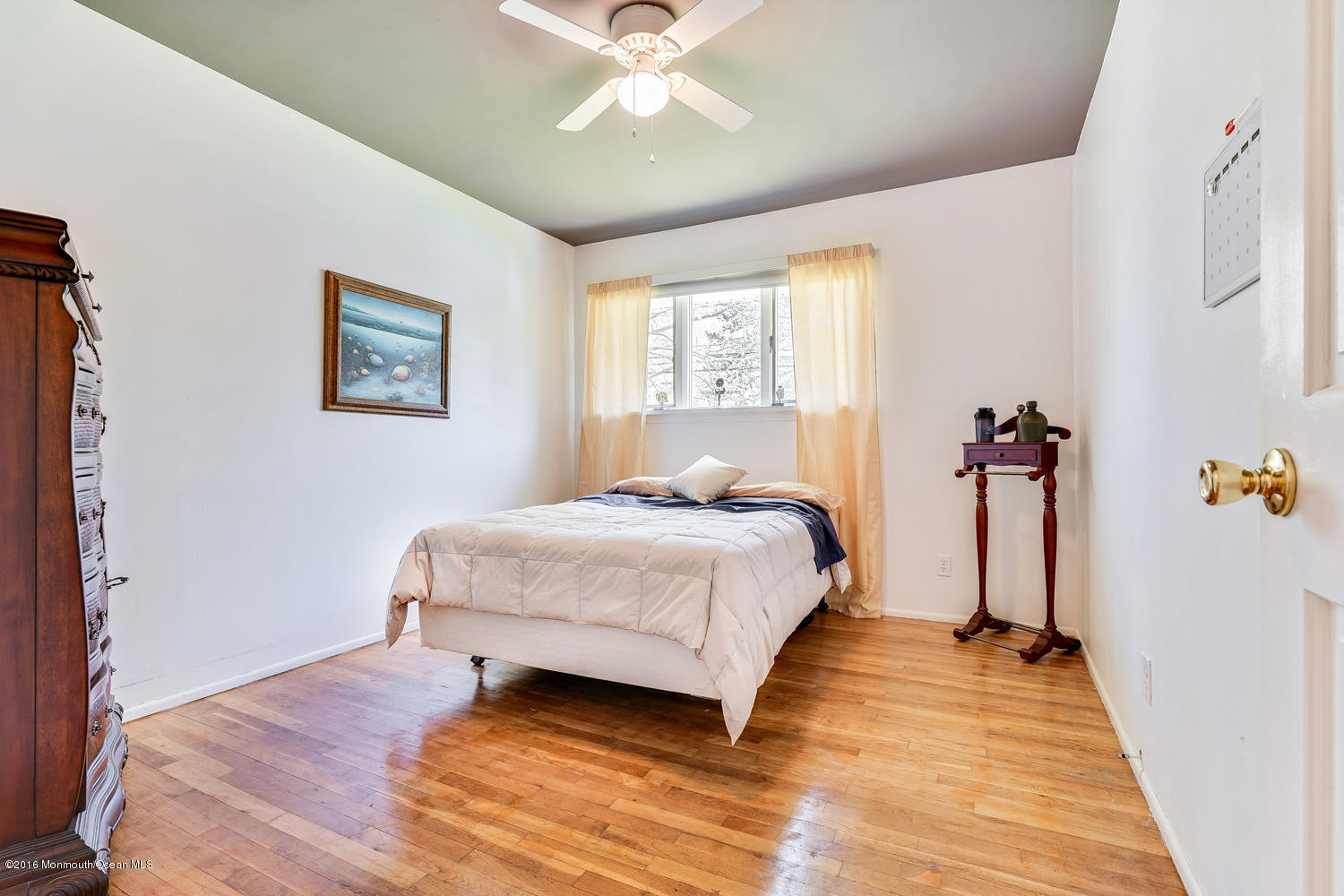9 Chestnut Ridge Road Holmdel, NJ 07733 - Photo 23 of 39 a bedroom with a bed and a window