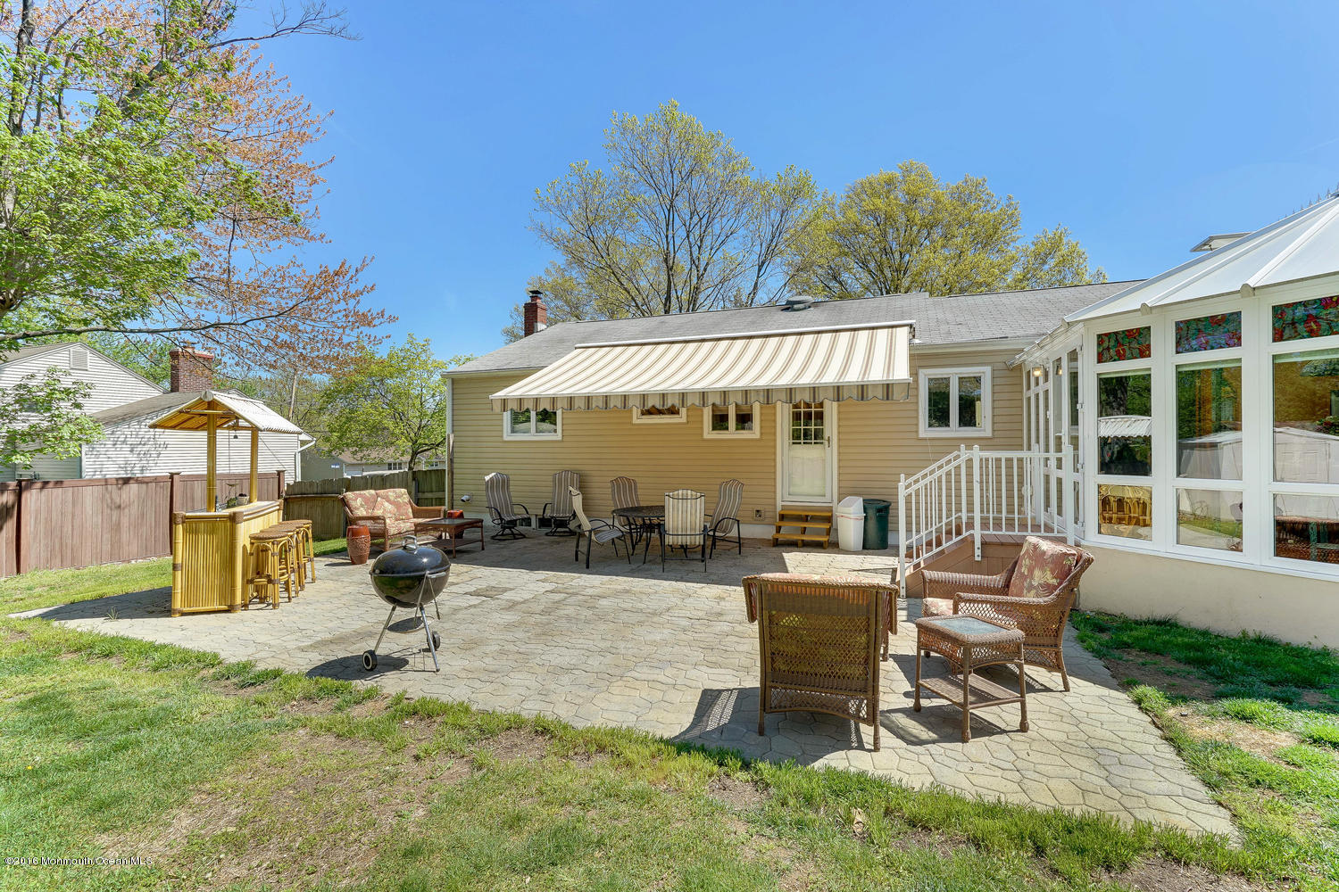 9 Chestnut Ridge Road Holmdel, NJ 07733 - Photo 33 of 39 a view of a house with a patio