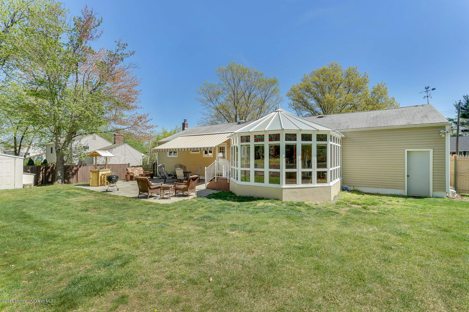9 Chestnut Ridge Road Holmdel, NJ 07733 - Photo 38 of 39 a view of a house with a big yard and large trees