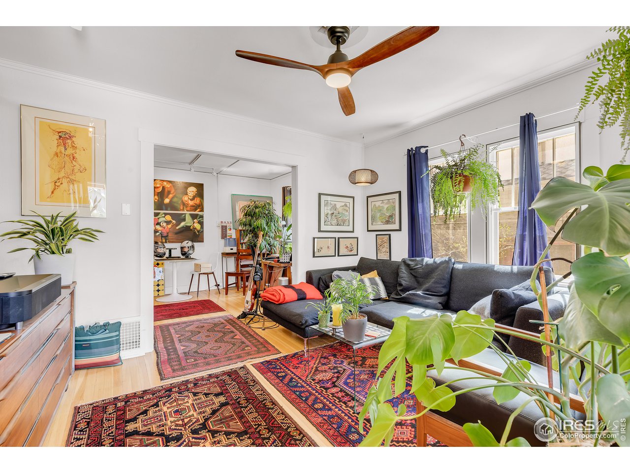 834-836 13th Street Boulder, CO 80302 - Photo 3 of 40 a living room with patio furniture and a potted plant