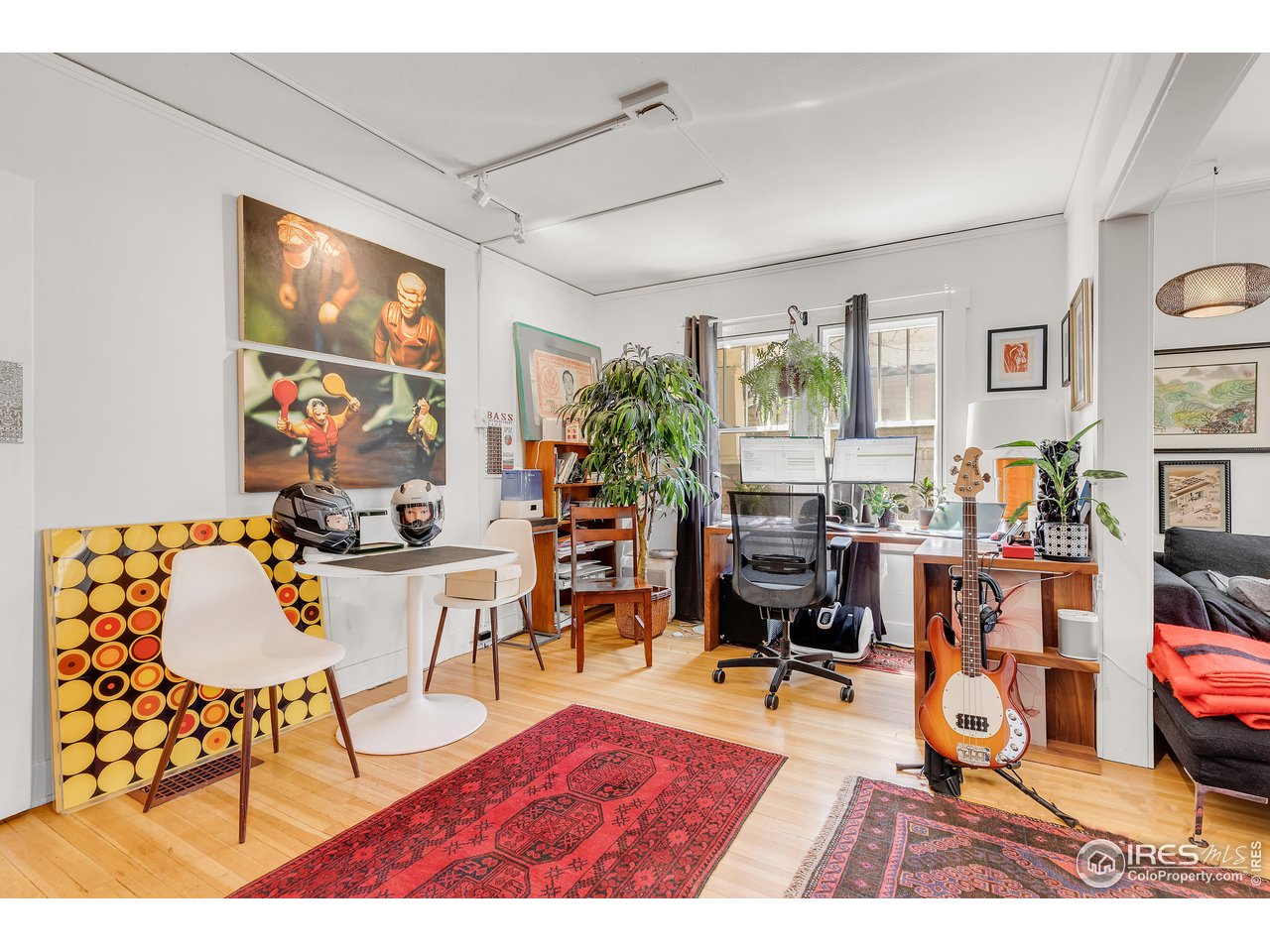 834-836 13th Street Boulder, CO 80302 - Photo 6 of 40 a living room filled with furniture and a flat screen tv
