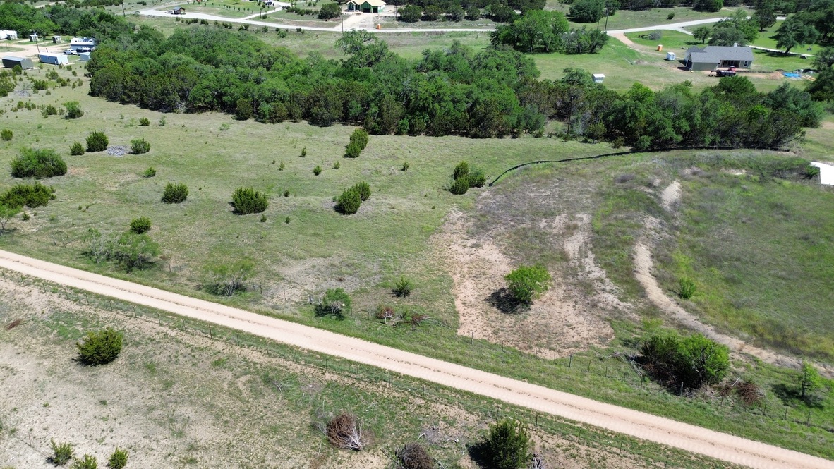 Lot 37 Garner Ranch Road Bertram, TX 78605 - Photo 3 of 9 a view of a yard with a tree