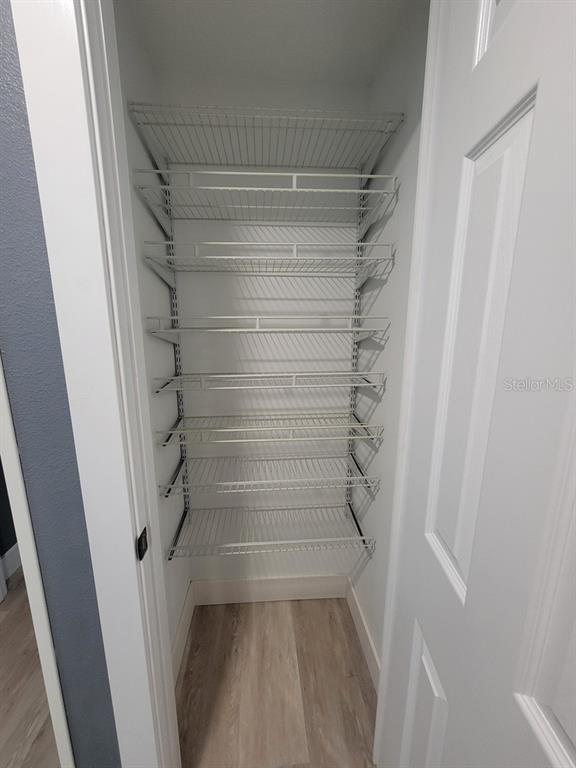 4944 Elkner Street New Port Richey, FL 34652 - Photo 11 of 24 a view of walk in closet