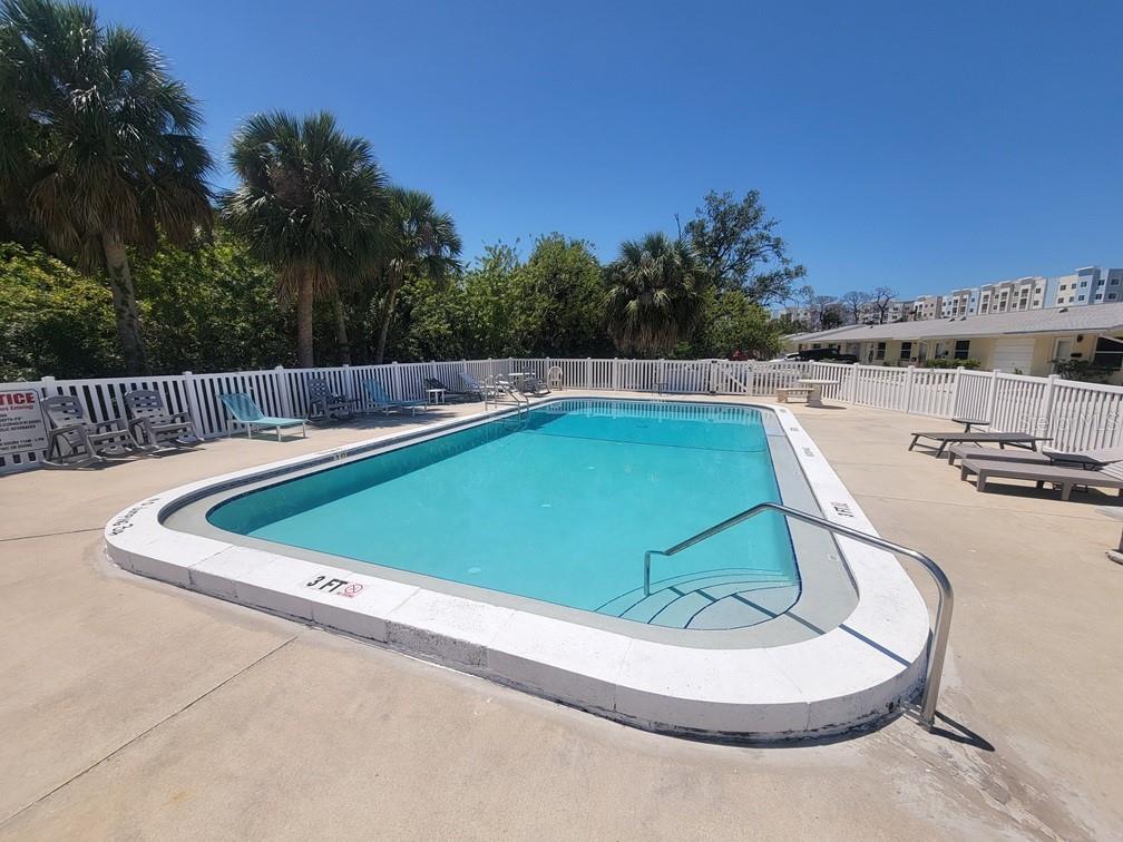 4944 Elkner Street New Port Richey, FL 34652 - Photo 22 of 24 a view of a chairs in a patio