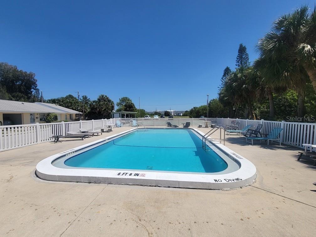 4944 Elkner Street New Port Richey, FL 34652 - Photo 23 of 24 a view of outdoor space and swimming pool