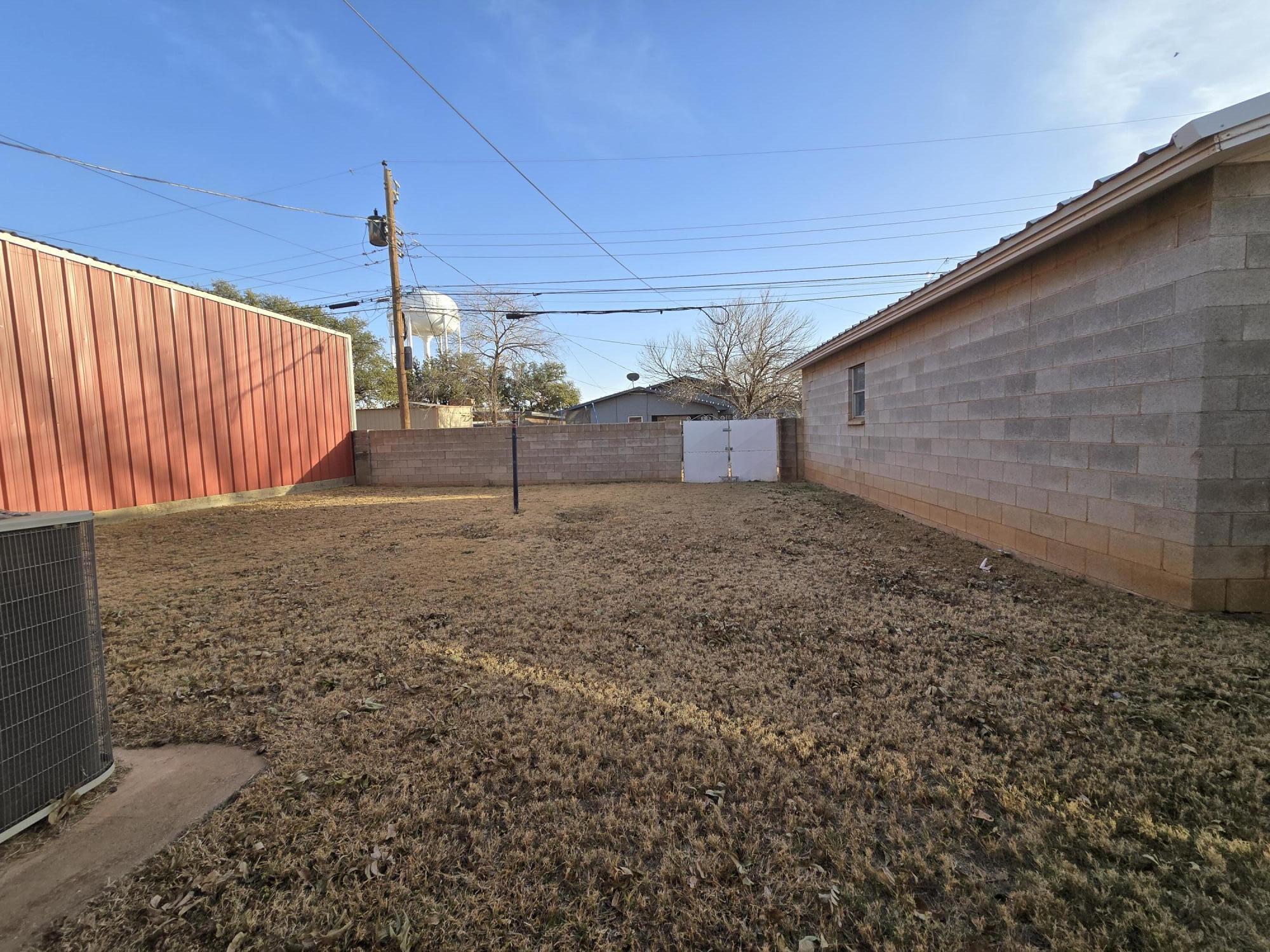 2229 South 6th Street Lamesa, TX 79331 - Photo 24 of 27 a view of a backyard
