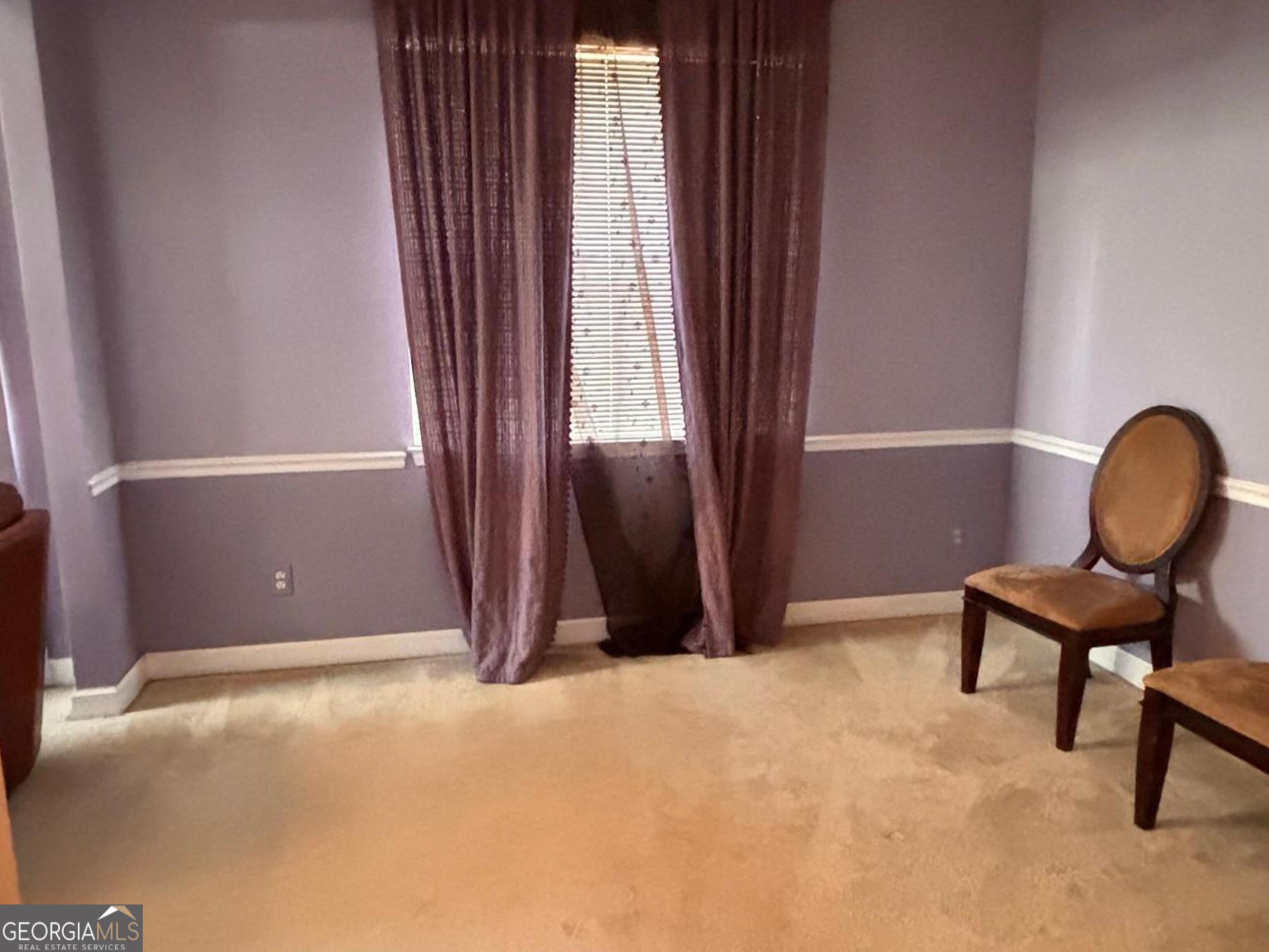 474 Fraser Street Southeast Atlanta, GA 30312 - Photo 11 of 21 a view of a workspace with furniture and a window
