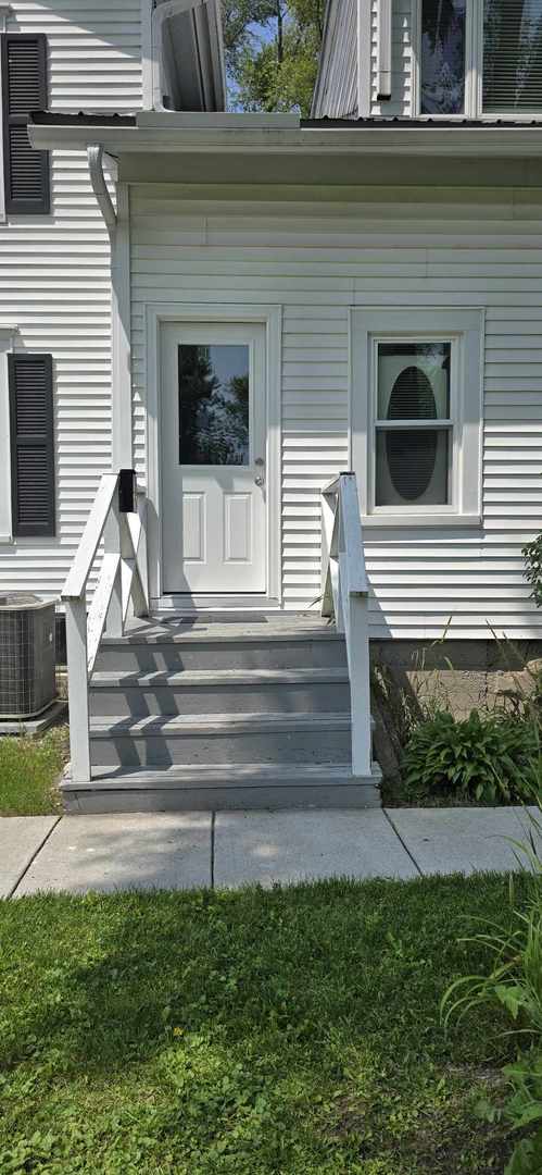 11718 Thayer Road Hebron, IL 60034 - Photo 11 of 14 a view of a house with a window