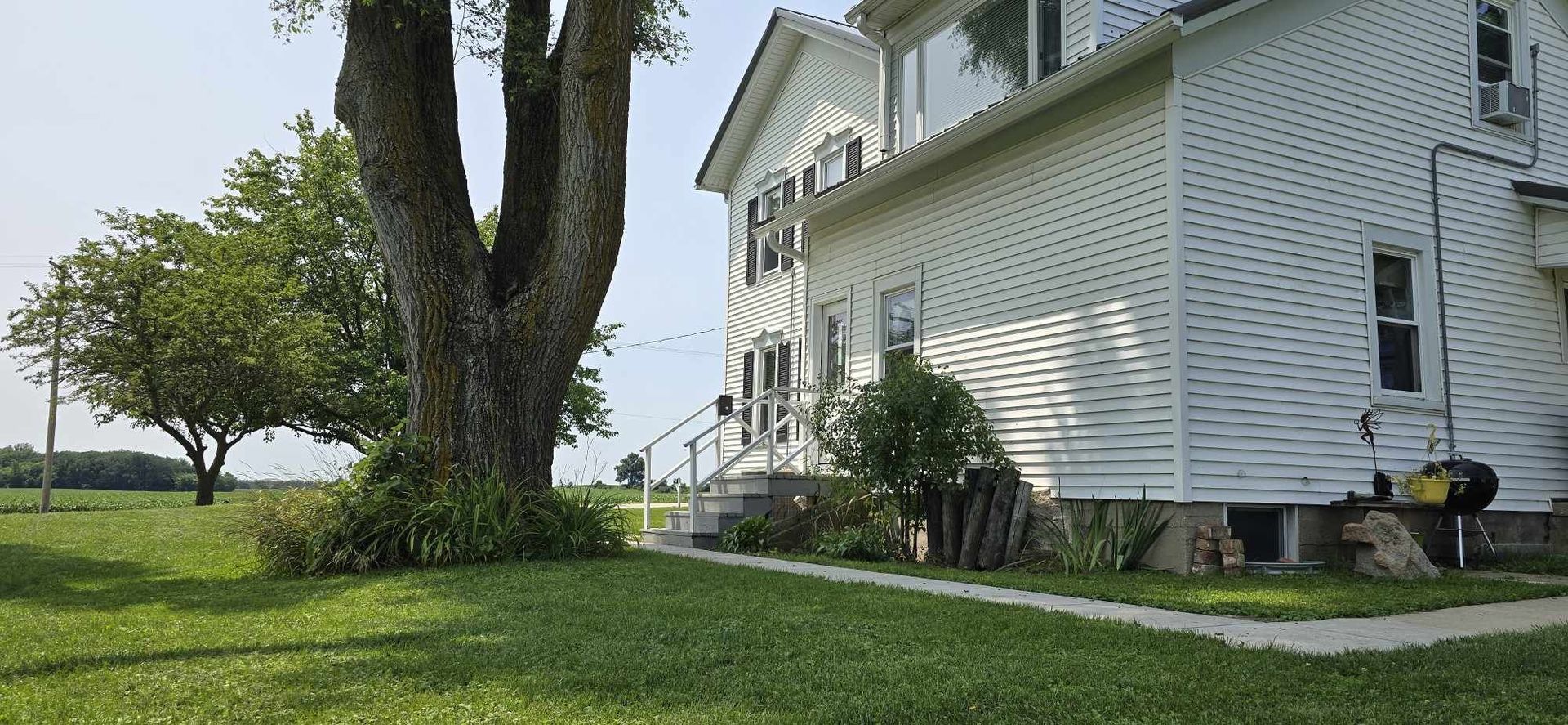 11718 Thayer Road Hebron, IL 60034 - Photo 12 of 14 a view of a house with a yard