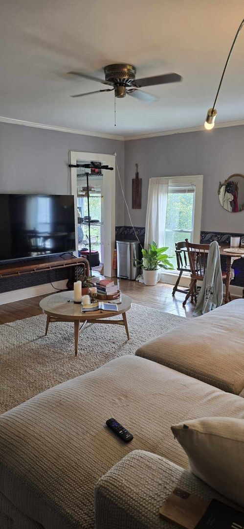 11718 Thayer Road Hebron, IL 60034 - Photo 3 of 14 a living room with furniture and a flat screen tv