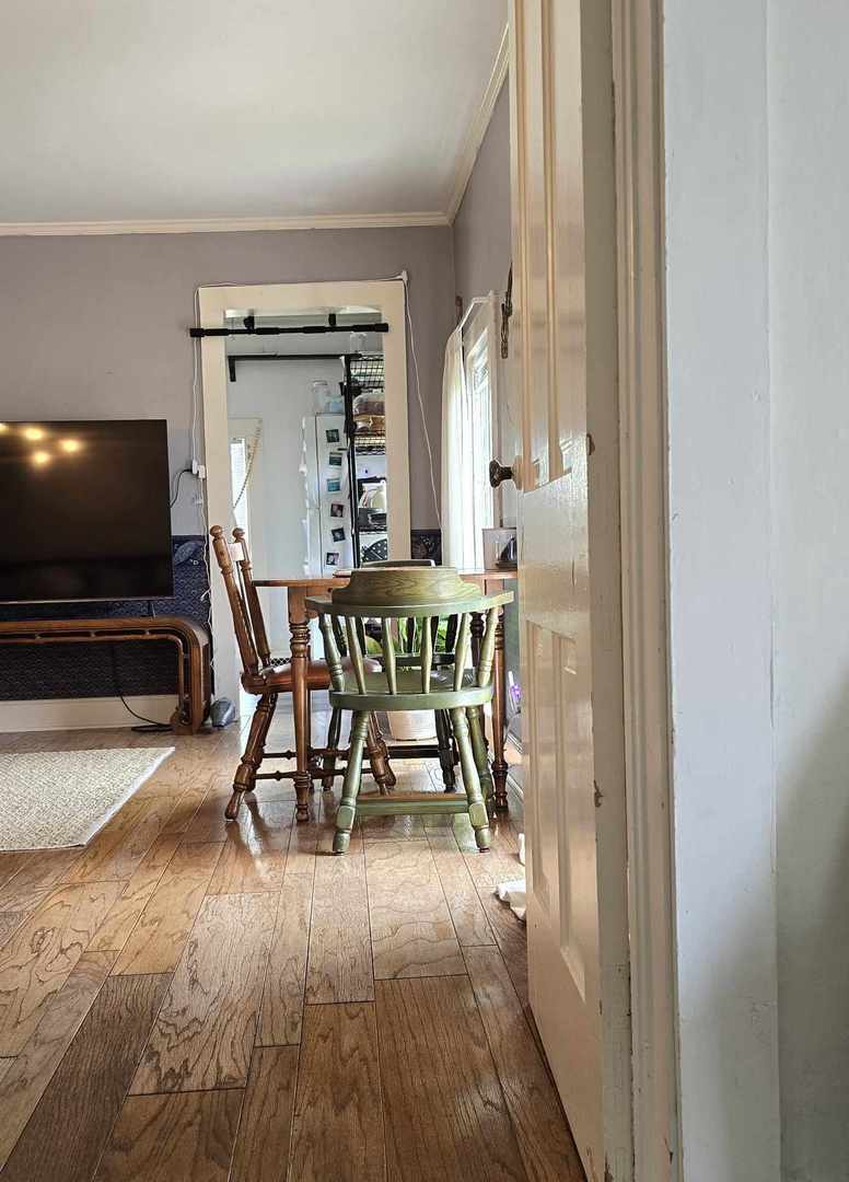 11718 Thayer Road Hebron, IL 60034 - Photo 5 of 14 a view of a livingroom with furniture and a window