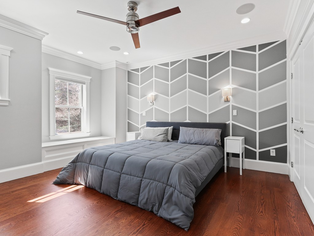 63 Herrick Road, Unit 2 Newton, MA 02459 - Photo 17 of 38 a bedroom with a bed and a window