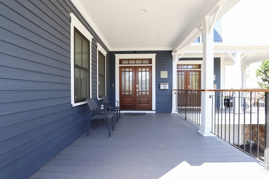 63 Herrick Road, Unit 2 Newton, MA 02459 - Photo 3 of 38 wooden floor and outdoor space