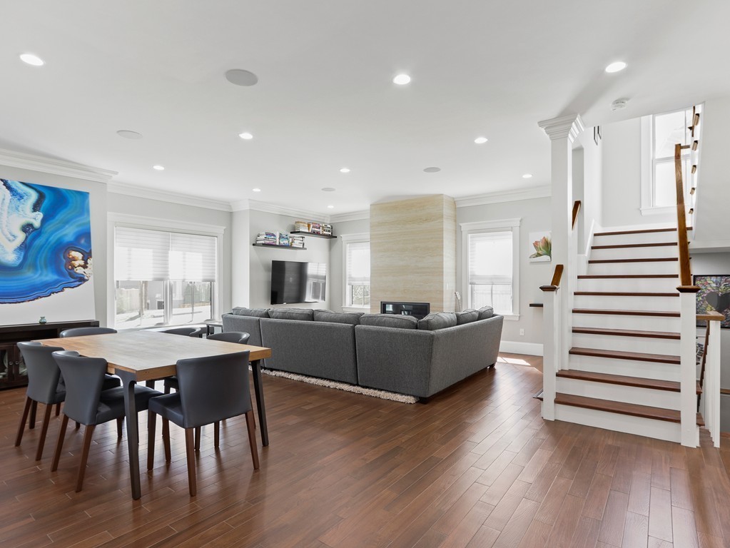 63 Herrick Road, Unit 2 Newton, MA 02459 - Photo 5 of 38 a living room with furniture and wooden floor