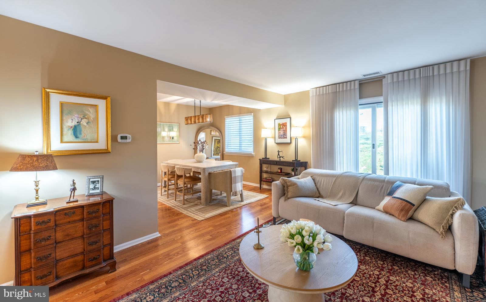 204 Camsten Court Chesterbrook, PA 19087 - Photo 15 of 56 a living room with furniture and a large window